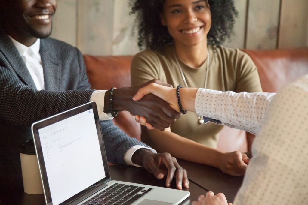 Agent explaining documents to clients